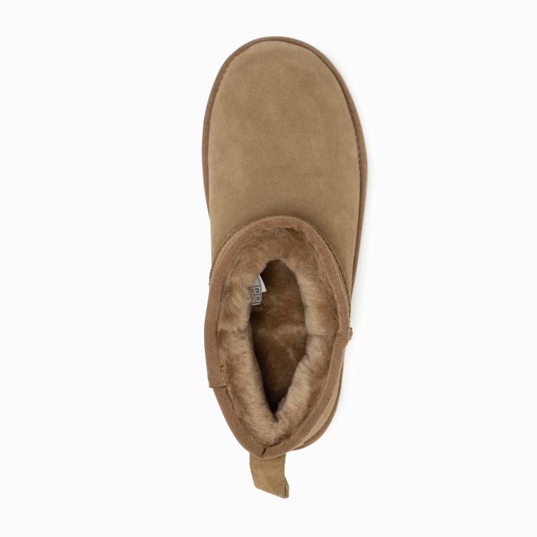 Tan suede sheepskin-lined slipper top view