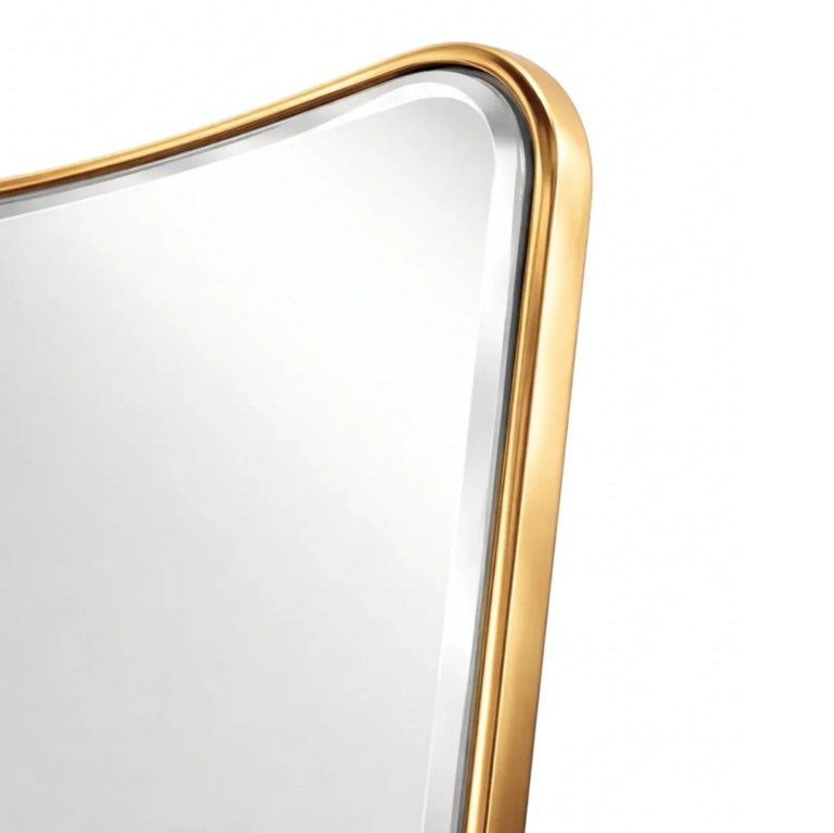 interior ave pierre full length gold frame wall mirror — classic statement Close-up of gold-framed mirror corner
