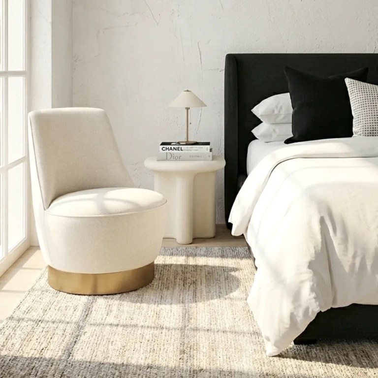 interior ave santorini stone side table ivory Modern bedroom corner with chair and bedside table