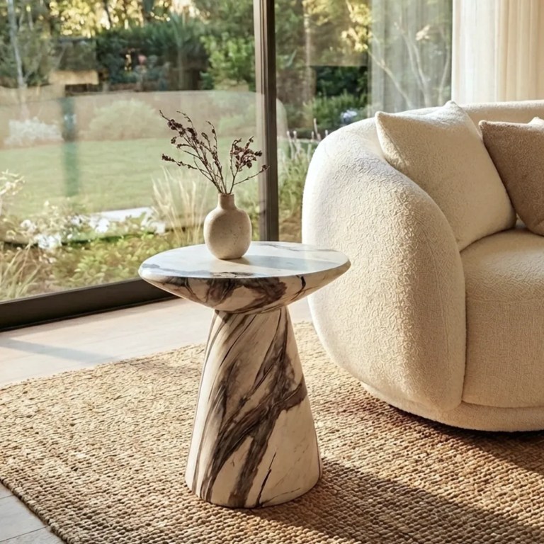 interior ave veneta stone side table panda marble finish Marble side table beside cream sofa by window