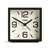 Black square clock showing 10:10 time