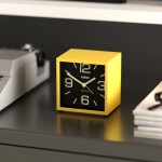 newgate cube mantel clock citrus yellow Yellow cube desk clock on black table