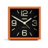 Orange square desk clock with black face