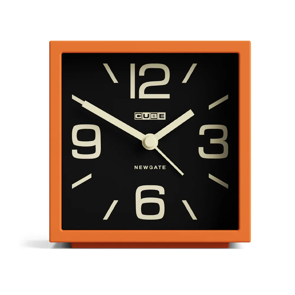 Orange square desk clock with black face