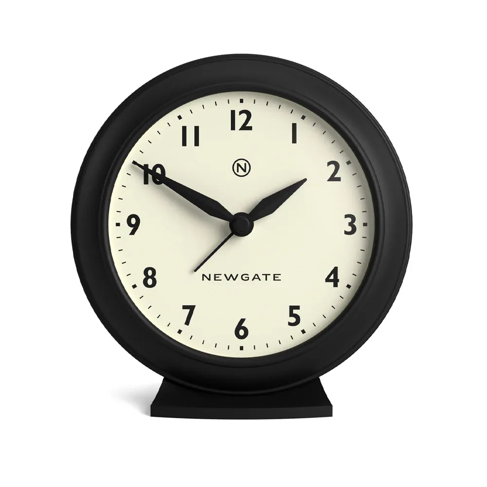 Black Newgate analogue clock showing ten past ten
