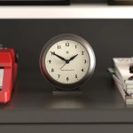newgate pacific mantel clock graphite Round Newgate clock on shelf showing ten past ten