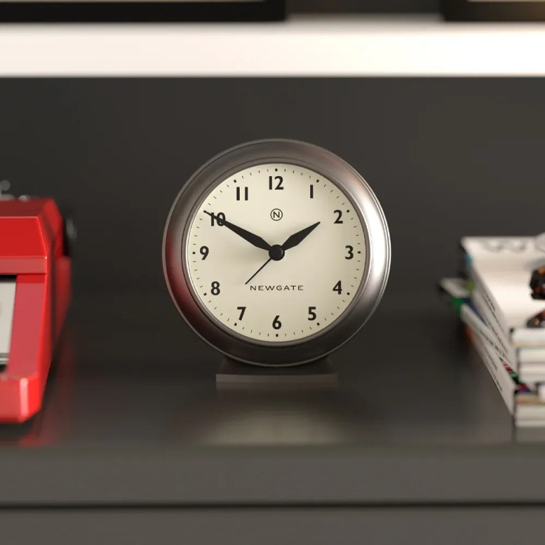 newgate pacific mantel clock graphite Round Newgate clock on shelf showing ten past ten