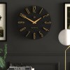 Black and gold modern wall clock