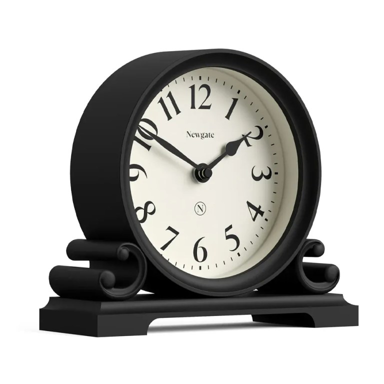 Black mantel clock with white face