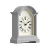 Grey arched mantel clock with Roman numerals