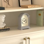 newgate fillmore mantel clock clockwork grey Classic mantel clock on cream bookshelf