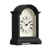 Black arched mantel clock with Roman numerals
