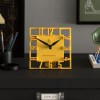 Yellow square desk clock with cut-out numerals