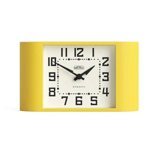 Yellow retro mantel clock with white face