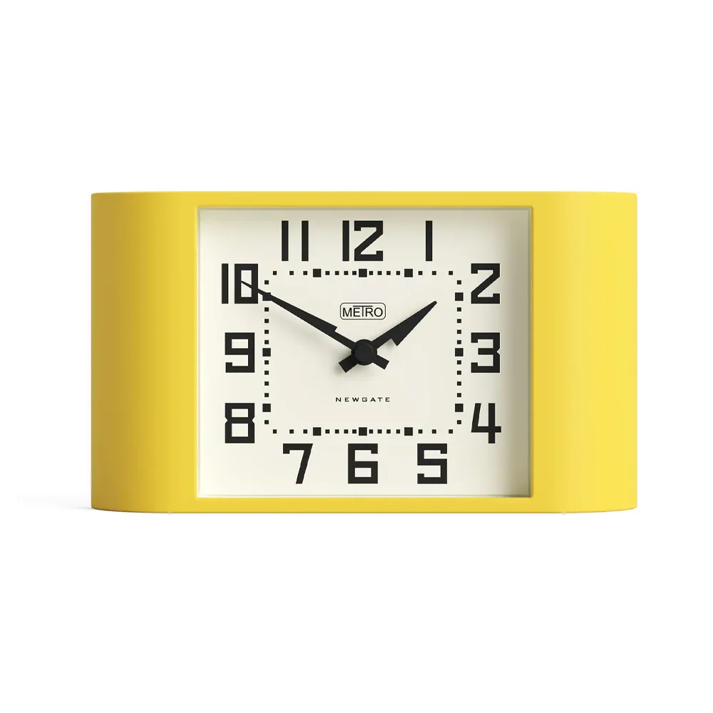 Yellow retro mantel clock with white face