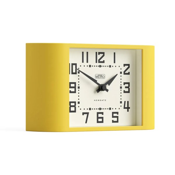 Yellow rectangular mantel clock with white face