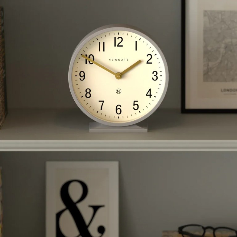 newgate q mantel clock clock grey Round white wall clock on shelf