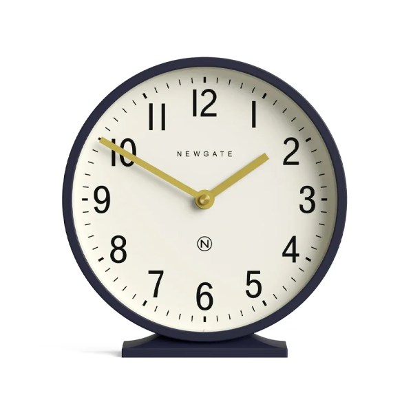 v398 ng manq371pebl 00.webp Modern navy desk clock showing ten past ten