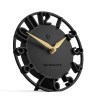 Black modern desk clock with gold hands