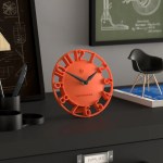 newgate timewarp mantel clock orange Modern orange desk clock on black table