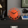 Orange modern desk clock with cut-out numbers