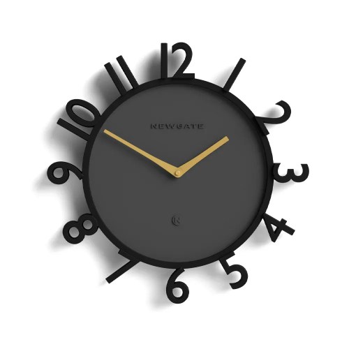Modern black wall clock with gold hands