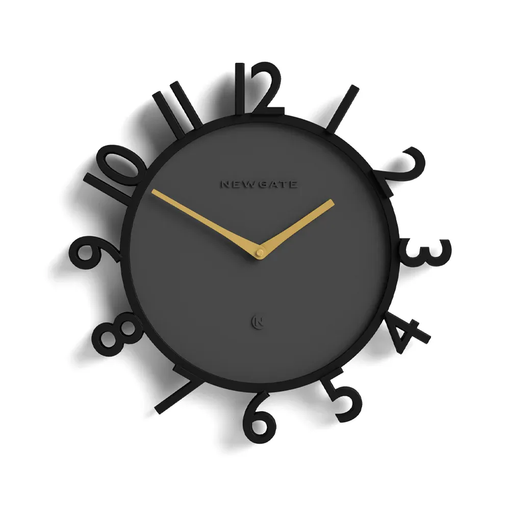 Modern black wall clock with gold hands