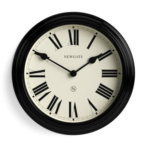 Black wall clock with Roman numerals