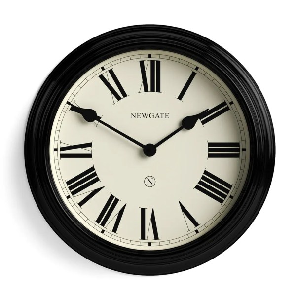 Black wall clock with Roman numerals