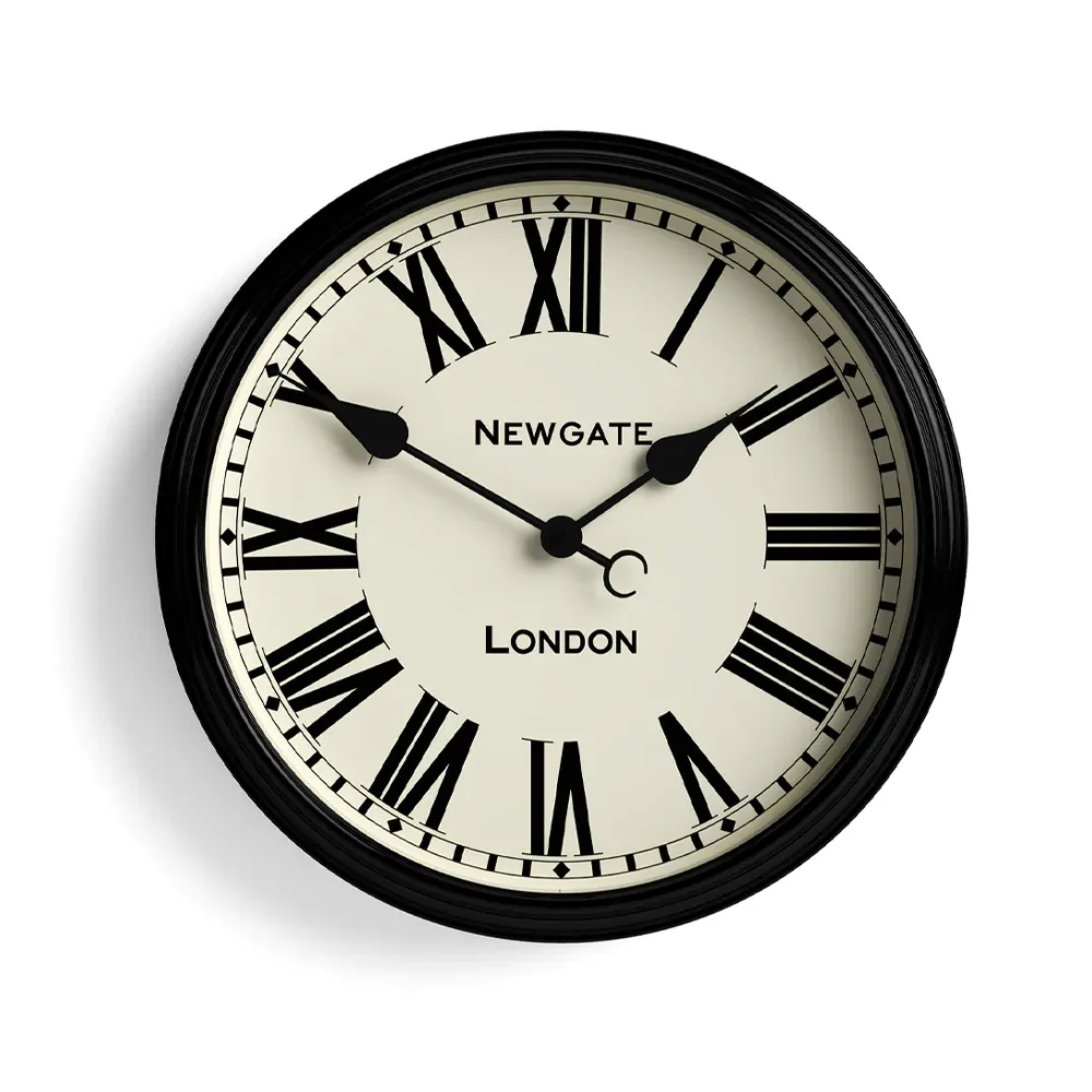Black Roman numeral wall clock showing ten past ten
