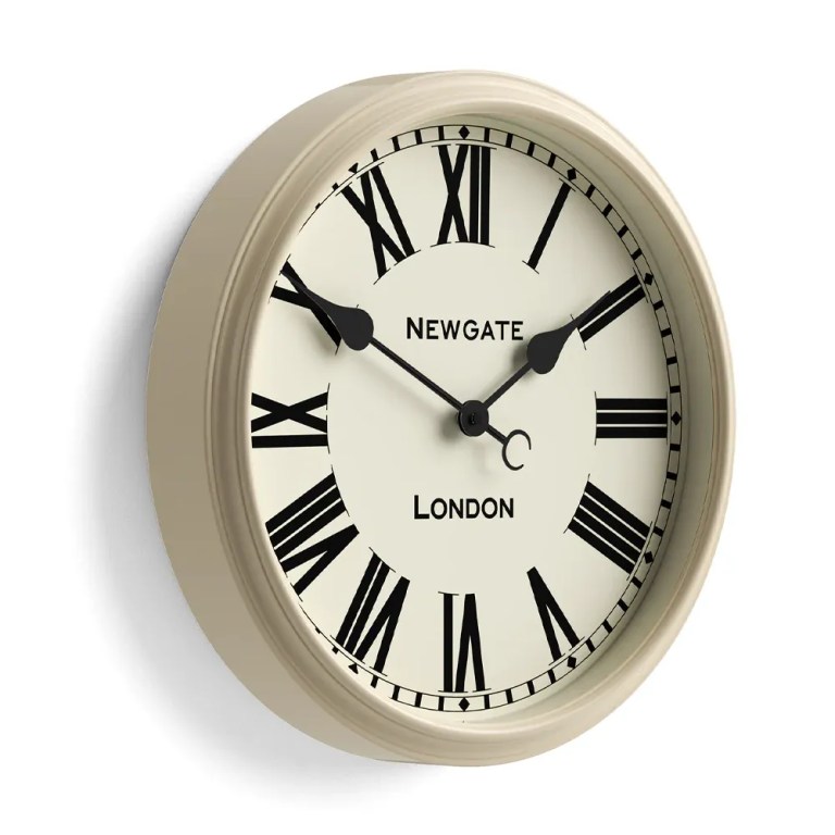 Beige wall clock with Roman numerals