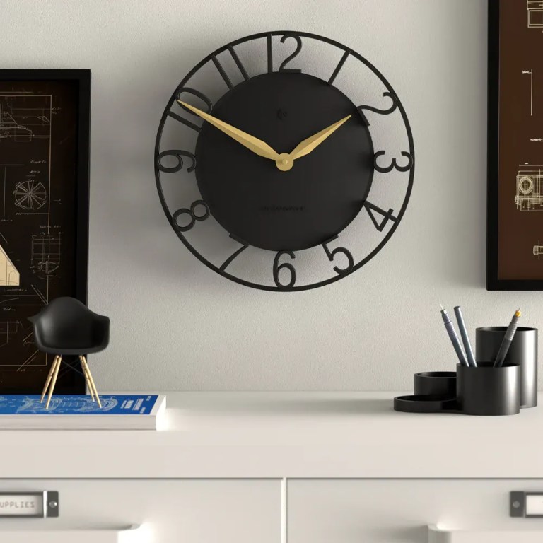 newgate time traveller wall clock black Modern black wall clock above minimalist desk