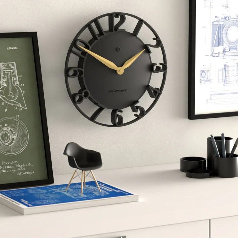 newgate time traveller wall clock black Modern black wall clock above minimalist desk