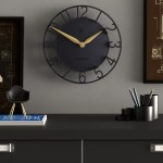 newgate time traveller wall clock petrol blue Modern black wall clock with gold hands