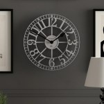 Large decorative wall clock on grey wall