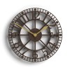 Large brown metal wall clock with gold hands