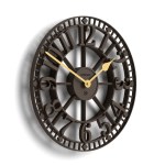 Large vintage metal wall clock with Roman numerals