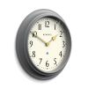newgate westhampton clock posh grey Close-up of grey wall clock with gold hands