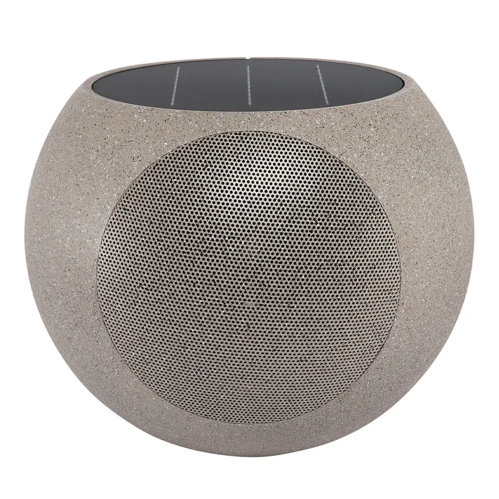 Round stone-look portable Bluetooth speaker