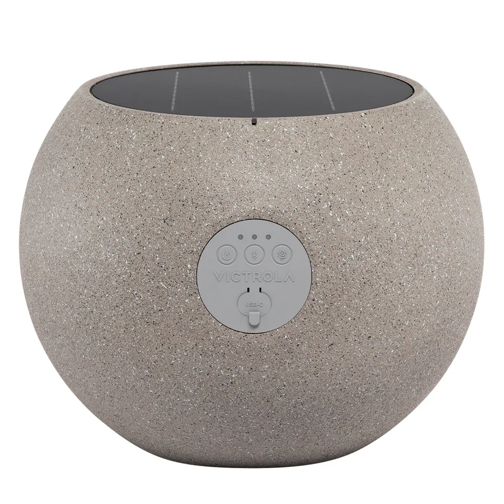 Stone-textured solar Bluetooth speaker with controls