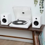 victrola automatic turntable + victrola tempo bookshelf speakers bundle white White turntable with speakers on wooden table