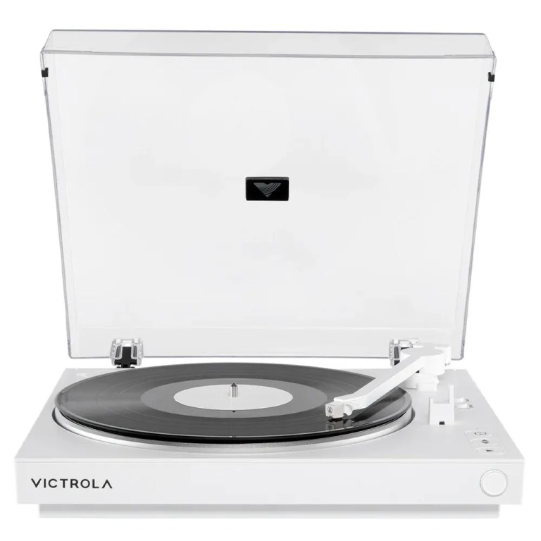 victrola automatic turntable + victrola tempo bookshelf speakers bundle white White Victrola turntable with vinyl record and dust cover