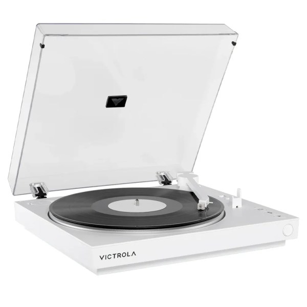 victrola automatic turntable white White Victrola turntable with vinyl record and lid open