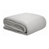 v442 atx blanket waffle silver sb 79341 00.jpg Folded light grey waffle-textured blanket