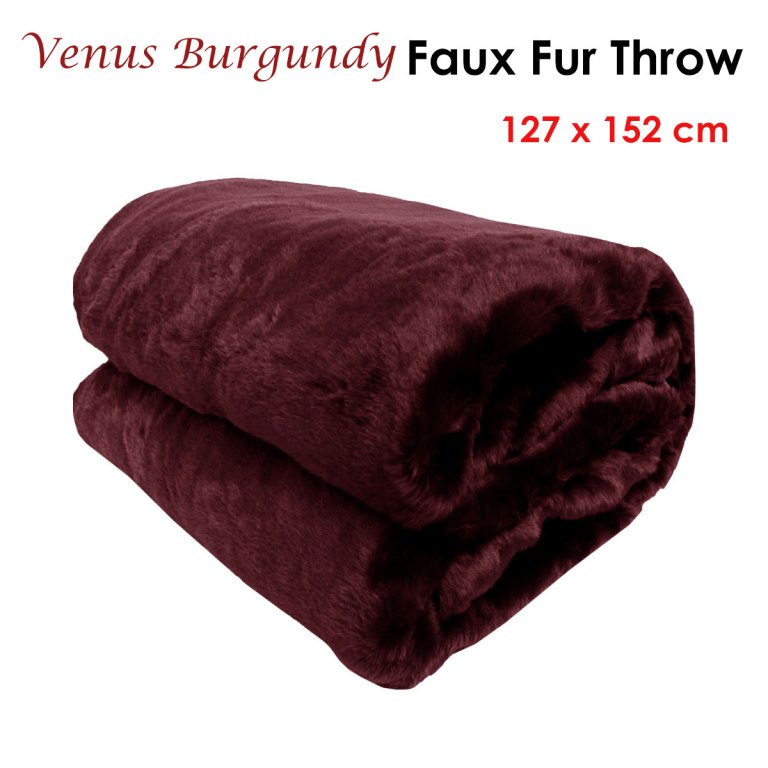 Folded burgundy faux fur throw blanket