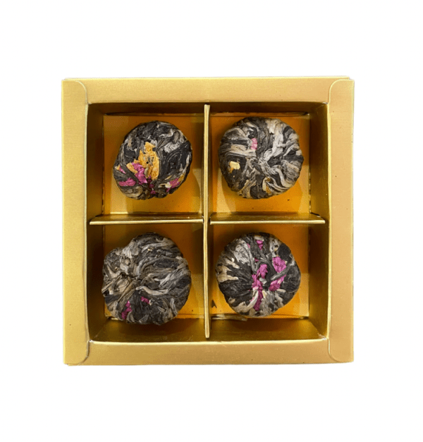 v466 64200404 202508221625 00.png Four blooming tea balls in gold gift box