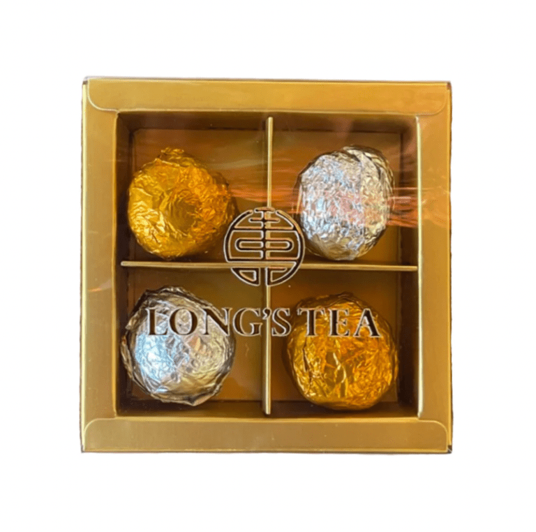 Boxed assortment of foil-wrapped tea balls