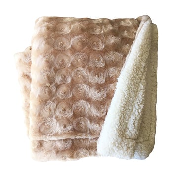Beige plush blanket with sherpa lining folded