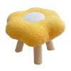 Fried egg shaped stool with wooden legs
