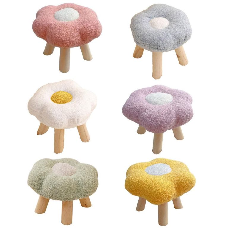 Six pastel flower-shaped stools with wooden legs